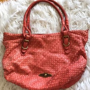Coral leather weaved bag